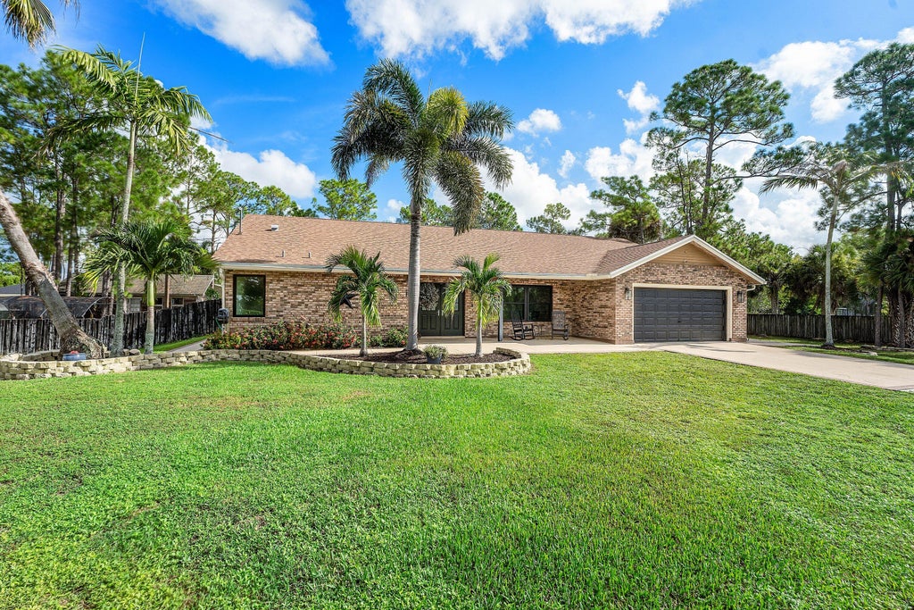 Photo of 18429 Sycamore Drive W, Loxahatchee, FL 33470 (MLS # B26070685)
