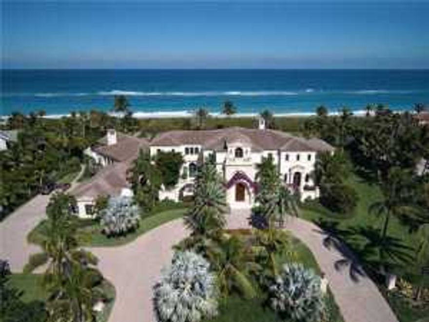 A magnificent 2 acre oceanfront home site and 300' of Atlantic beachfront make this grand estate home one of Sailfish Point's most prestigious addresses. Grand Mediterranean-style architecture blends with elegant interior enhancements all highlighted by panoramic Atlantic Ocean views from every room. The comforts of home combine with sophisticated elegance to create an old-world charm inside and out. Designed for family living and entertaining.