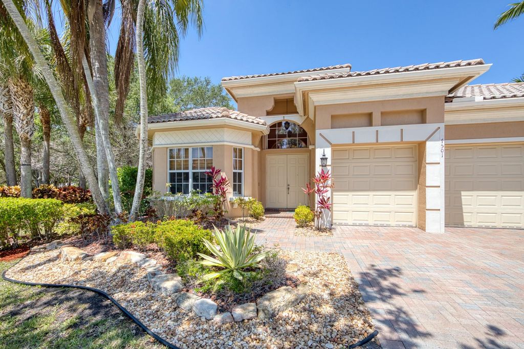 Photo of 7501 NW 115th Terrace, Parkland, FL 33076 (MLS # F10500719)
