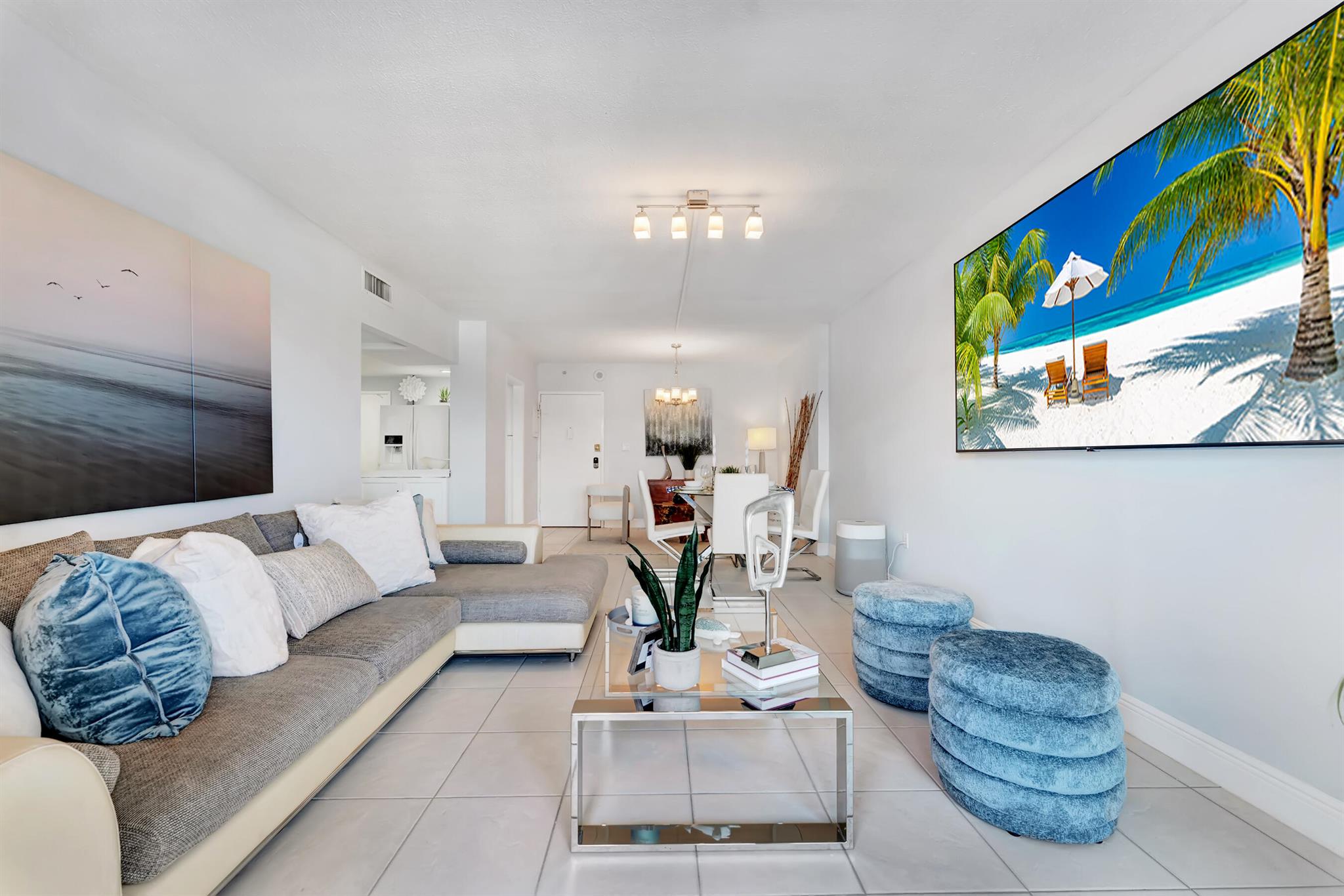 Live the ultimate S Florida lifestyle in this spacious 2-bedroom, 2-bath condo featuring some of the best waterfront and skyline views in the building. A true boater's paradise, this unit offers the rare opportunity to rent an on-site boat slip with unrestricted ocean access and a quick 10-minute ride to the world-famous Haulover Sandbar and Inlet. Perfectly situated across from Sunny Isles Beach and only minutes from Aventura Mall, fine dining, and shopping, this condo combines convenience with luxury. New windows fill the living spaces with natural light and frame breathtaking views of the Sunny Isles skyline and Intracoastal waters. Resort-style amenities include 24-hr security, waterfront pool, gym, salon, tailor, and laundry on every floor.