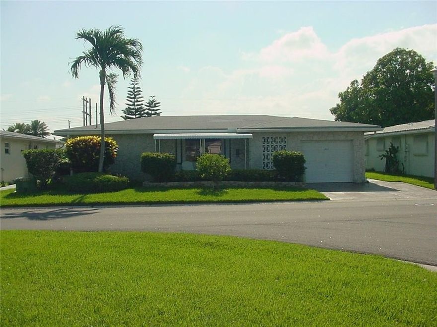 Truly one of a kind! Upgraded kitchen with newer appliances, built in pantry, large living room, huge family room, formal dining area & sitting area owner uses as office. Beautiful tile throughout, no carpet. The yard is to die for! Nice patio with sun-setter awning, fenced in (Yes, this home has a fence!) with fluffy grass, nice long dock with stunning water views. Nicely landscaped yard, very well maintained. The driveway was widened to fit 2 cars. Guest parking across the street! Solar water heater.