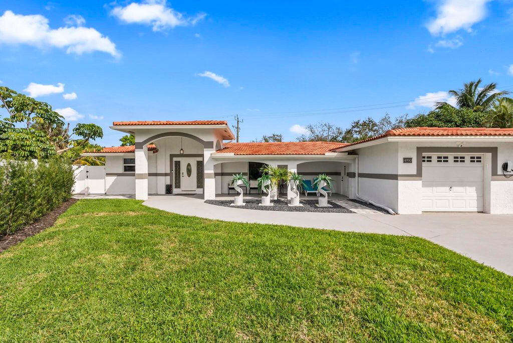 Photo of 4990 NW 2nd Court, Boca Raton, FL 33431 (MLS # B26028899)