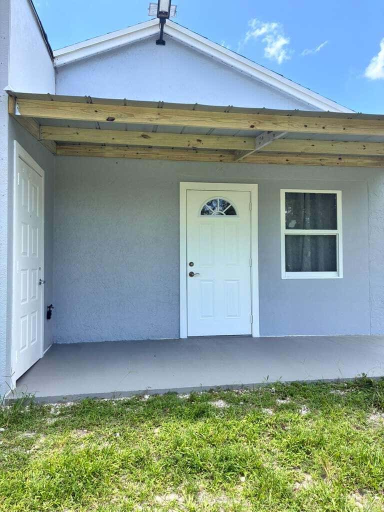 Photo of 9024 Apache Blvd #A, Loxahatchee, FL 33470 (MLS # B26047103)