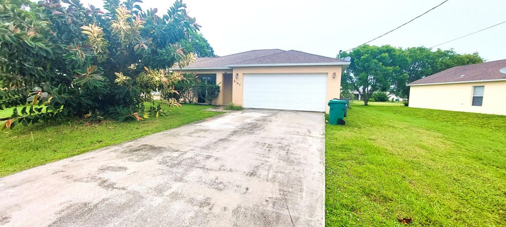 Photo of 2148 SE Mandrake Circle, Port Saint Lucie, FL 34952 (MLS # R10806038)