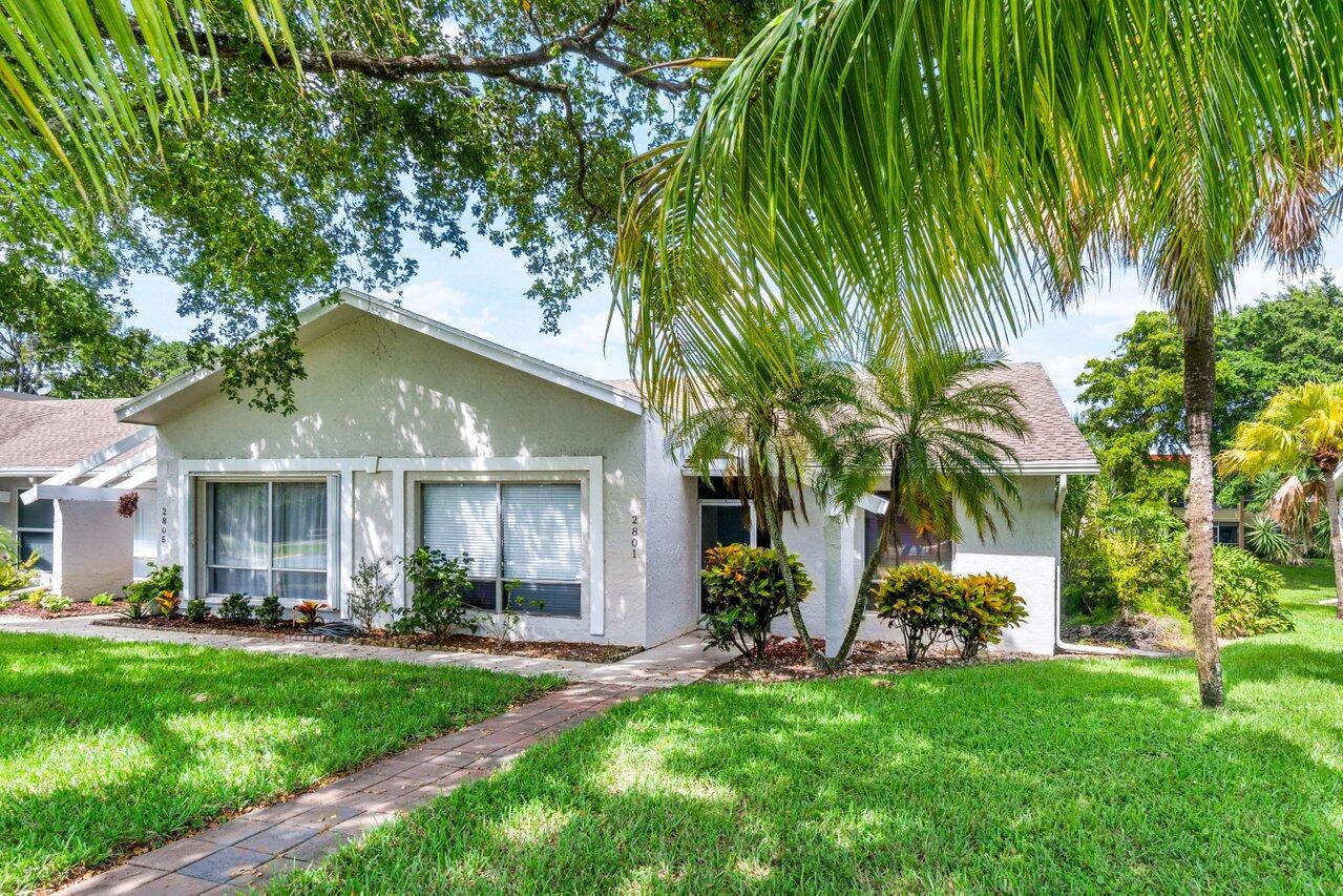 Amazing Opportunity to own a rarely available & beautifully updated 2/2 Villa in the Heart of Delray Beach! This end unit offers amazing natural light, vaulted ceilings, brand new kitchen/bathrooms, large bedrooms with their own walk-in closets and a private covered patio overlooking the canal. Amenities include Pool, Fitness Area, Library, Billiards and Private Clubhouse!Vacation Getaway - Investment Property - or Home Sweet Home!Lago Del Rey is a wonderfully landscaped community located just west of i95, mere minutes from 'The Ave' of trendy downtown Delray which is home to a myriad of world famous restaurants & shops!