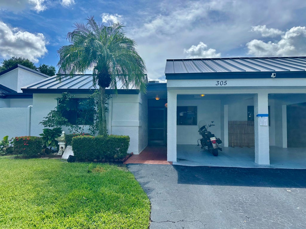Photo of 305 Lakeside Court, Sunrise, FL 33326 (MLS # B26075533)
