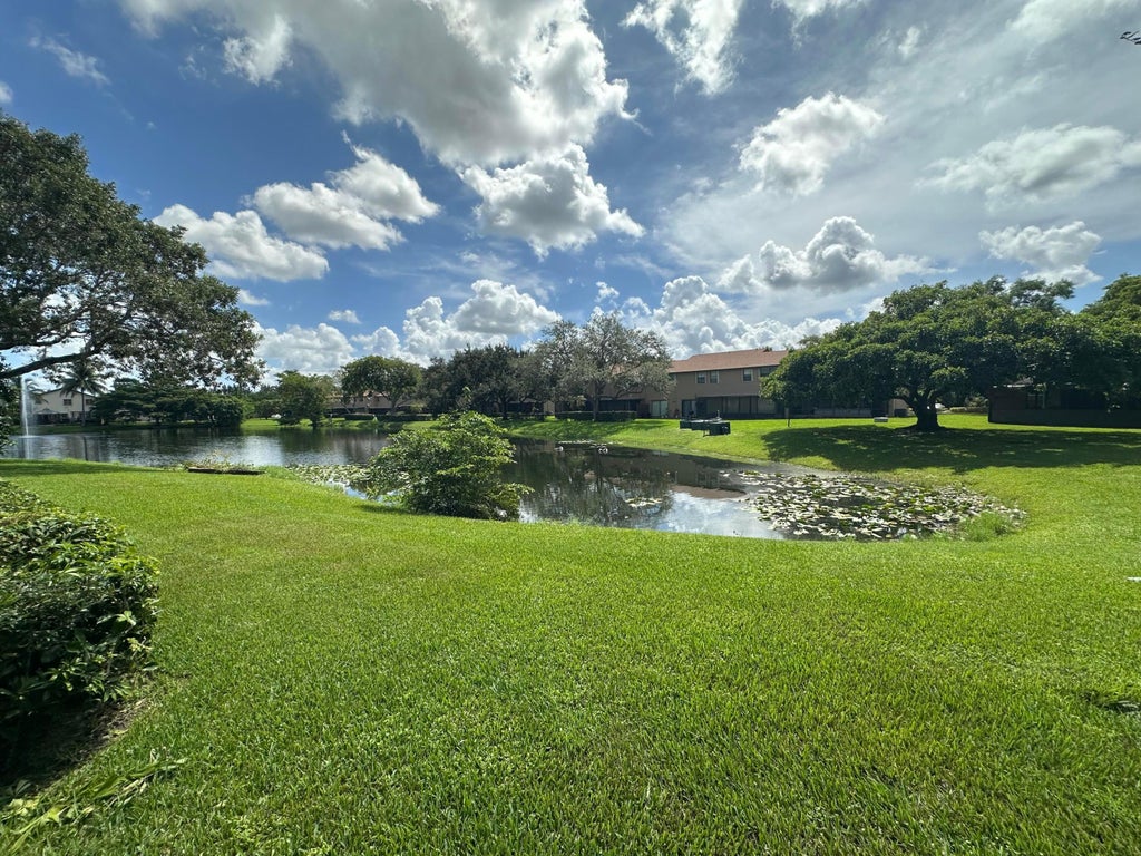 Photo of 305 Lakeside Court, Sunrise, FL 33326 (MLS # B26075533)