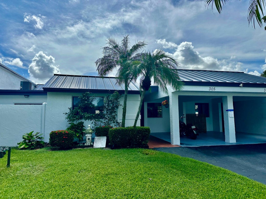 Photo of 305 Lakeside Court, Sunrise, FL 33326 (MLS # B26075533)