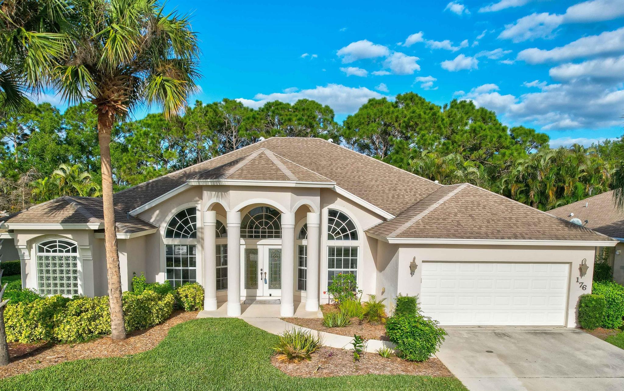 This stunning home was built by Royal Professional Builders with poured concrete and insulated walls for lasting strength and efficiency. The popular Liberty model offers a spacious floorplan with 4 bedrooms plus a den that easily converts to a 5th bedroom, 3 full baths, and a 2-car garage.One of the baths doubles as a cabana bath with direct access to the screened-in pool and patio--perfect for entertaining. The kitchen has been recently upgraded with new quartz counters, stainless steel sink, modern faucet, and a custom tile backsplash.Inside, soaring ceilings and an open-concept layout create a light, airy feel that makes the home live even larger. Outside, enjoy the spacious covered and screened patio or take a dip in the custom-built pool with heated spa.