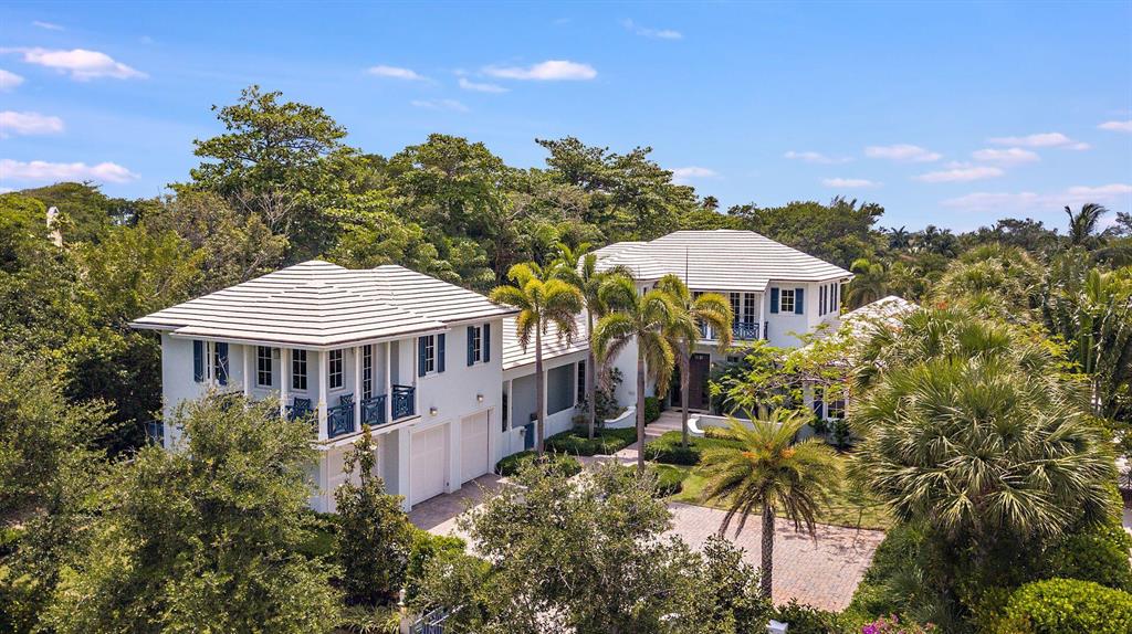 Elegant and sophisticated, the stunning coastal compound in Gulf Stream offers the best in luxury living. Complete with deeded gated beach access and your own private dock (with water and electric service) on a private cove. Situated on over 1.24 acres, the custom-built residence boasts over 9,500 total square feet in the main house and guest house. Easy living with a first floor primary and guest bedroom and formal living room. This home features; formal living and dining rooms; gourmet kitchen; wide plank wood floors, marble in all bathrooms and custom finishes everywhere. Enjoy the resort-style pool; outdoor living areas; summer kitchen with grill; and loggia with fire pit and water views. Smart house; generator; air-conditioned garage with storage; and front entry gate. See more...