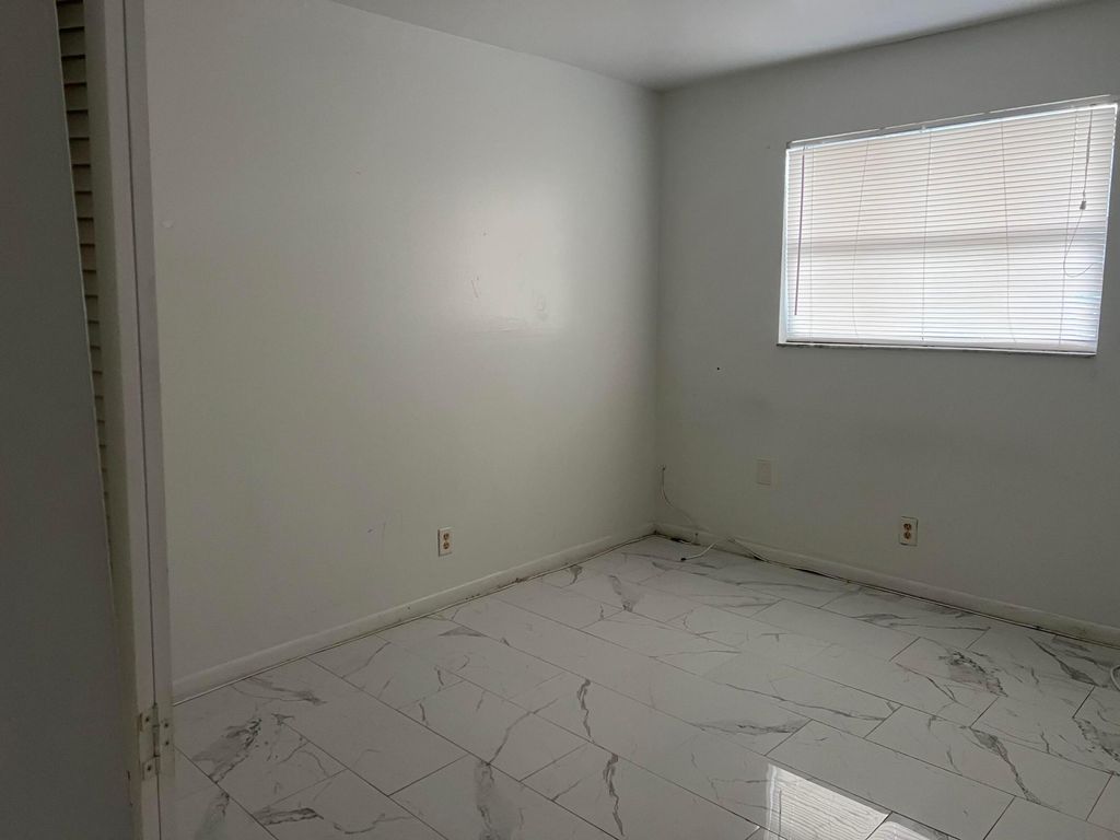 Photo of 101 NE 41st Street #E87, Oakland Park, FL 33334 (MLS # B26012499)