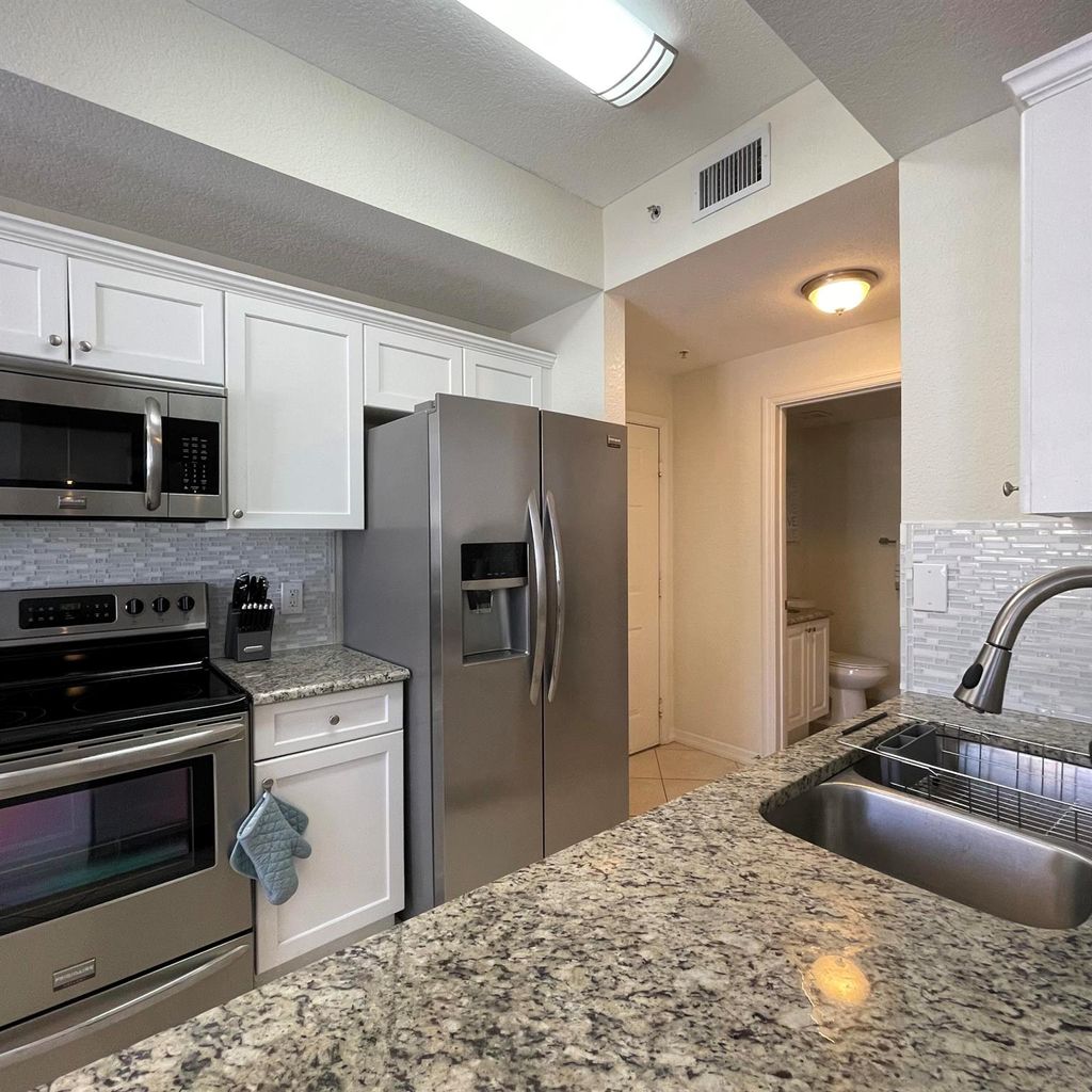 Photo of 11041 Legacy Boulevard #102, Palm Beach Gardens, FL 33410 (MLS # R10956601)