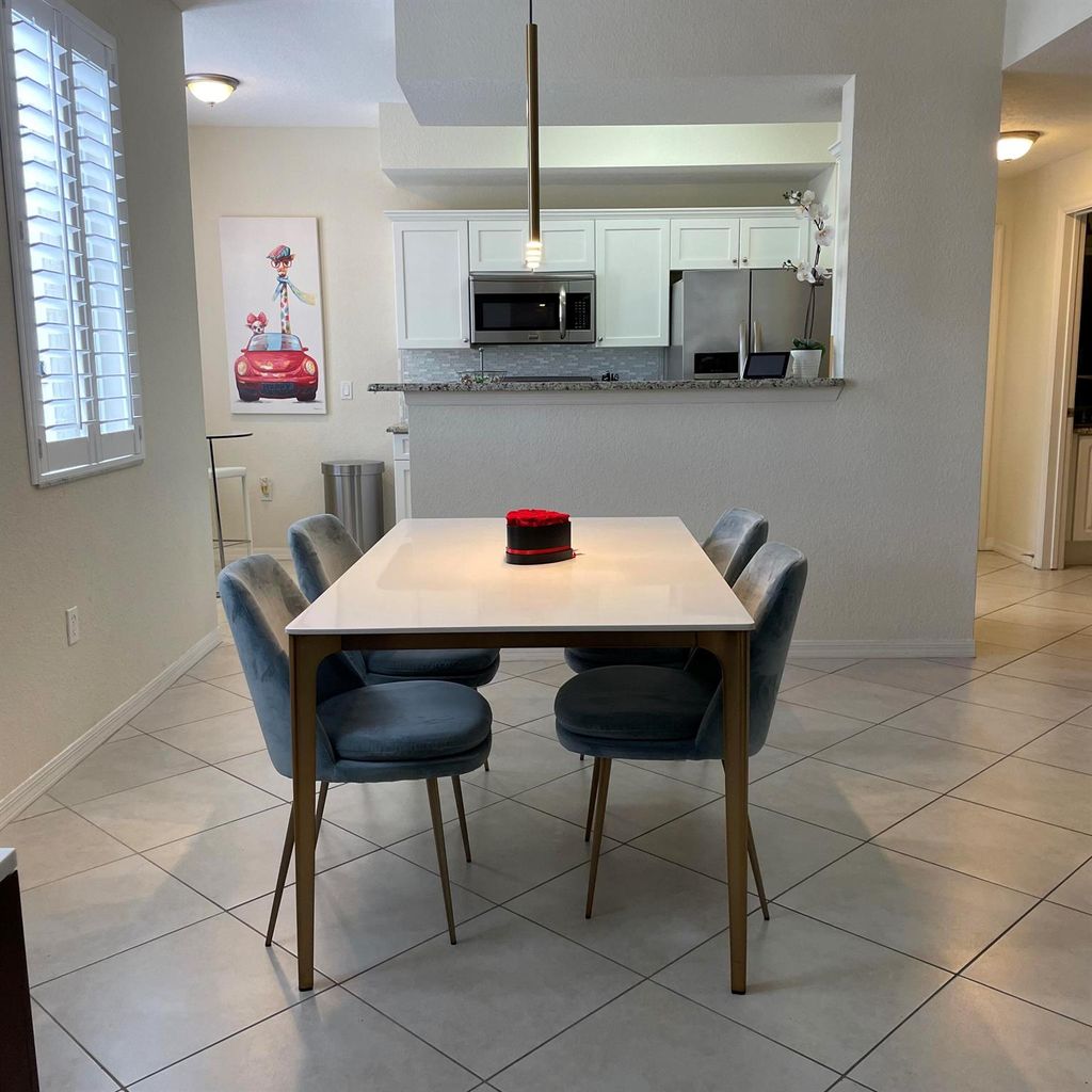 Photo of 11041 Legacy Boulevard #102, Palm Beach Gardens, FL 33410 (MLS # R10956601)