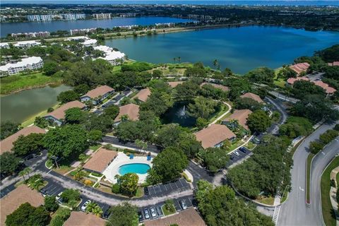 Photo of 2729 S Oakland Forest Drive S #101, Oakland Park, FL 33309 (MLS # B26006414)