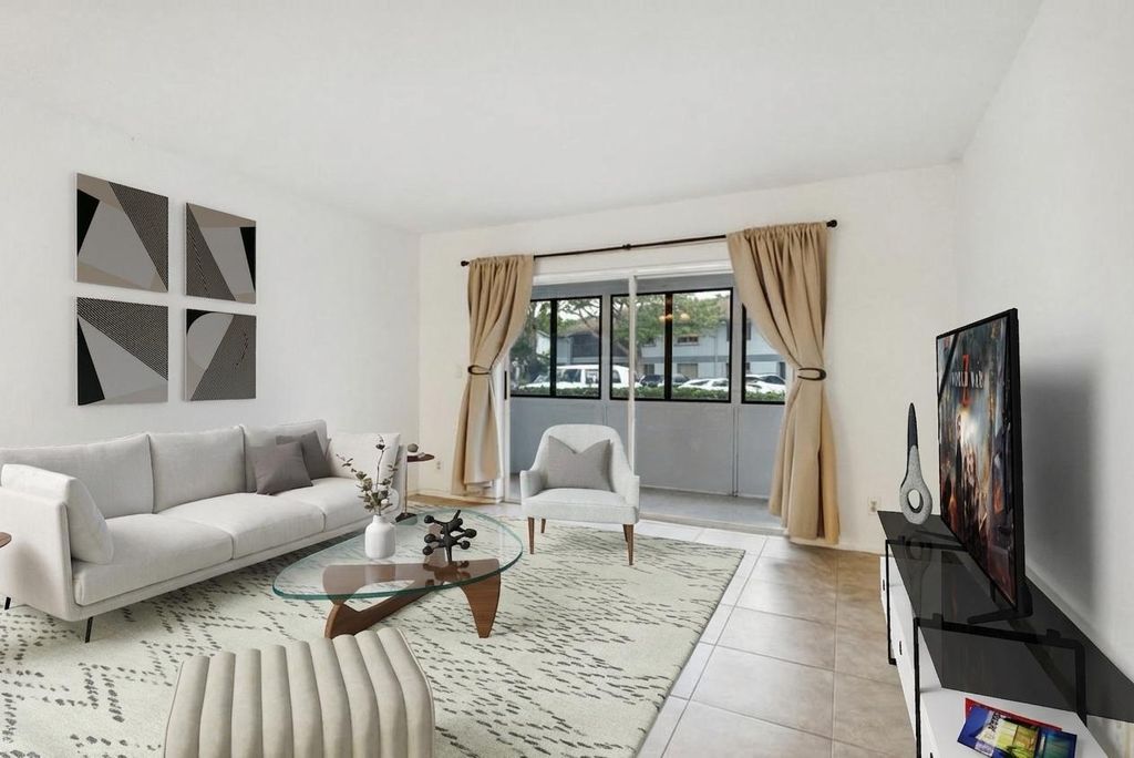 Photo of 2729 S Oakland Forest Drive S #101, Oakland Park, FL 33309 (MLS # B26006414)