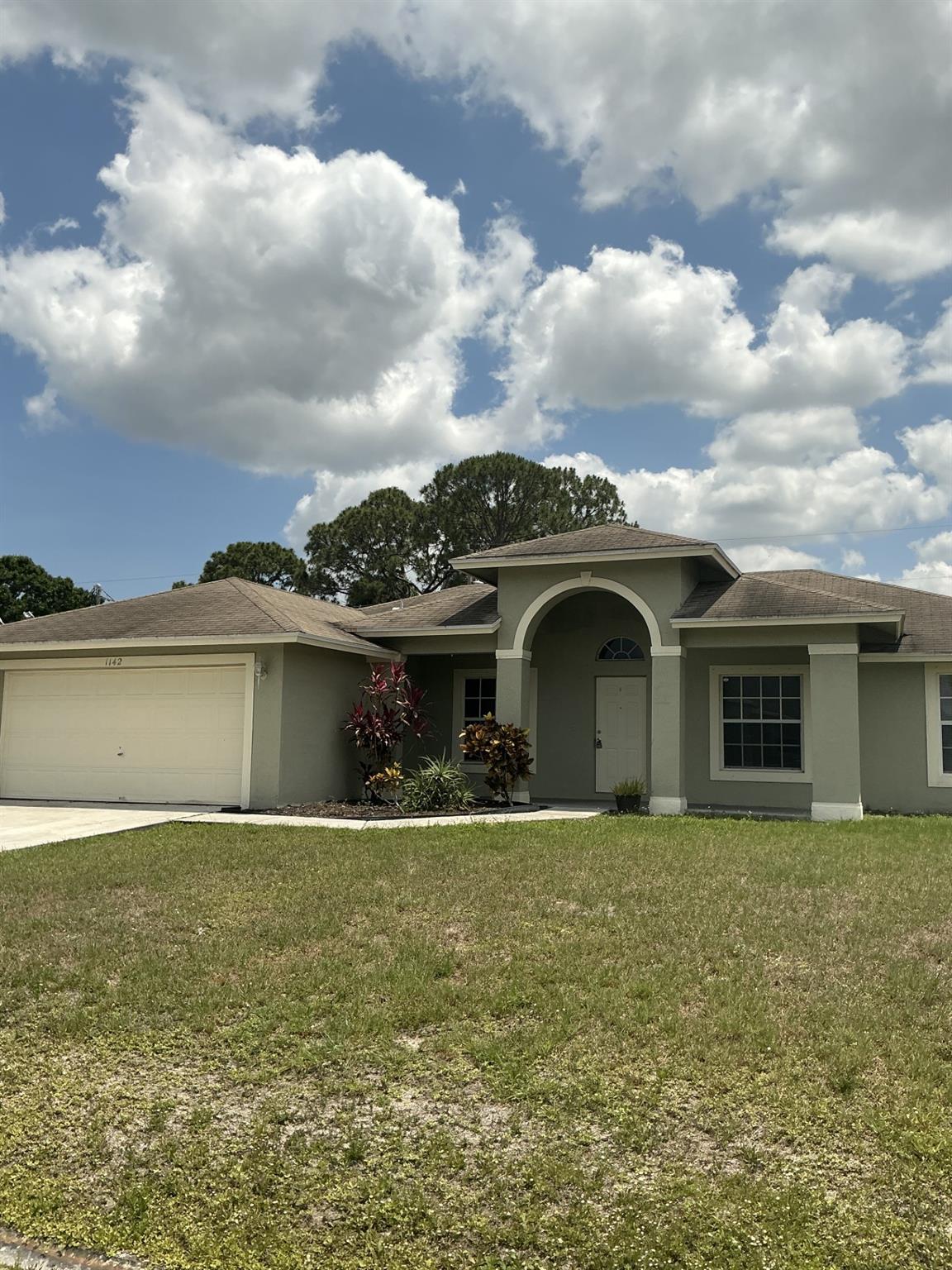 Welcome to this charming 3 bedroom, 2 bathroom rental in Port St Lucie, FL. This home features tile floors throughout the main living areas and cozy carpet in the bedrooms. The kitchen comes equipped with a refrigerator, stove, and dishwasher for your convenience. Enjoy the convenience of washer/dryer hook-ups inside the home. Pets are not allowed in this rental property. Don't miss out on this opportunity to make this lovely house your new home. Contact us today to schedule a viewing! Household monthly income must be 3x the rent to qualify. All Watson Property Management residents are enrolled in the Resident Benefits Package (RBP) for $39.95/month. More details upon application.