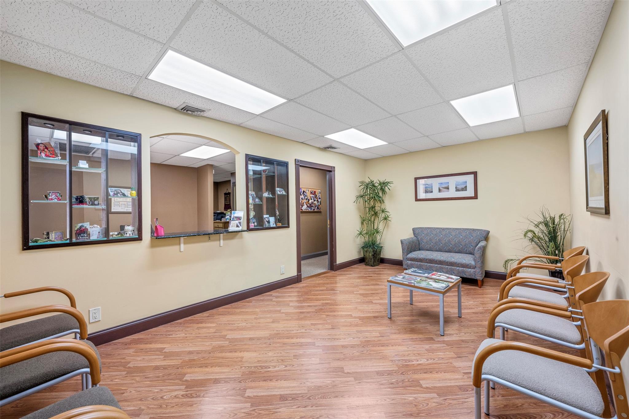 I am excited to share a unique opportunity: a turnkey medical office that is also perfect for any professional use. It features ample front and rear parking within a financially sound and well-managed association, where all units are owner-occupied businesses.
The space benefits from excellent natural light and includes four well-appointed general offices, an impressive waiting room, and additional storage and break areas.