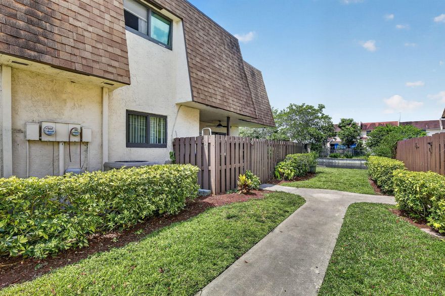 Updated, spacious, and move-in ready 3-bedroom, 2.5-bath townhome in North Lauderdale with beautiful lake views and low HOA dues of only $145 per month. This home features a welcoming courtyard entry, laminate wood flooring throughout, stainless steel appliances, granite countertops, plenty of cabinet space, and a functional layout that works well for everyday living and entertaining. Enjoy the peace of mind of a newer roof from 2020 and a home that needs nothing but a new owner. Perfect for first-time buyers, growing families, or anyone looking for space, comfort, and value. Centrally located near shopping, restaurants, major roads, and the airport. A great opportunity to own a well-maintained townhome in a convenient location