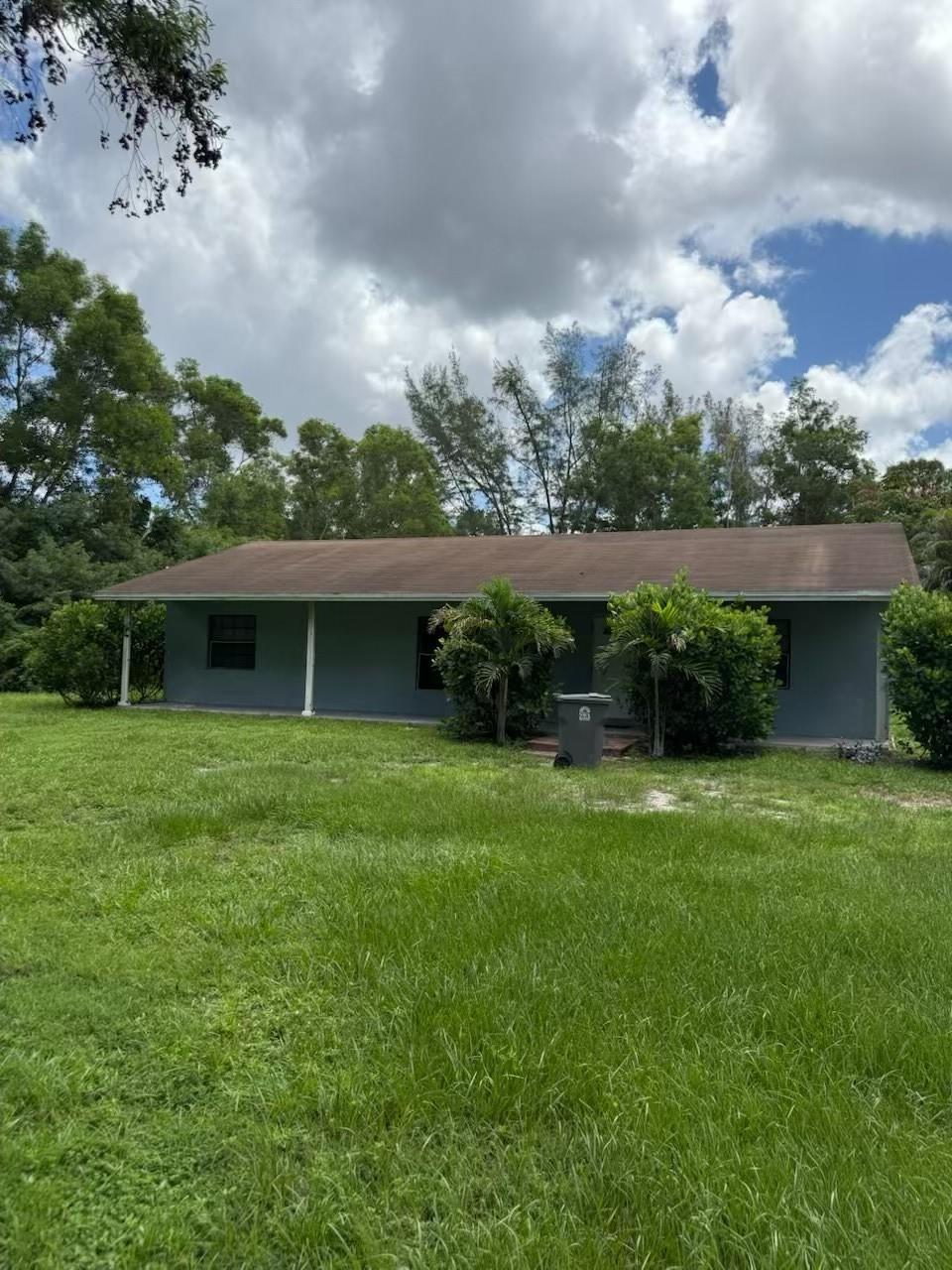 Discover this beautifully updated 4-bedroom, 2-bath single-family home on a spacious 1.25-acre lot—with NO HOA or restrictions! Enjoy modern touches like laminate and tile flooring, new A/C, updated water system and well, plus a new washer and dryer and newer kitchen appliances. This property offers country charm with room to roam—bring your RV, boat, or toys! Zoned Agricultural Residential, there's space to build an ADU (Accessory Dwelling Unit), detached garage, or even a pool. Buyers can roll in these improvements using a renovation loan—one mortgage that covers both purchase and upgrades! this home is a rare find in a peaceful yet convenient location near shopping, dining, and major highways.