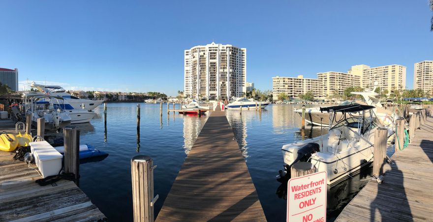 Great for an Investor..Boaters Dream.  Villa in popular Three Islands surrounded by the Intracoastal waterway. Enjoy Florida living in this upscale community with tennis court, pool, marina. This home includes a boat slip on the brand new T-dock Space #2  with water & electric in protected harbor with direct intracoastal access. Features include  vaulted wood-beamed ceilings, skylights, lots of closets and waterfront view. 2 assigned parking spaces conveniently located with plenty of guest space.  Unit can be rented as is for an investor or the Property can be remodeled to exactly your dream home. The options for this property are limitless. The dock can be used by the Owner, Tenant or the Owner can rent the dock space to parties outside of the community as an additional income stream
