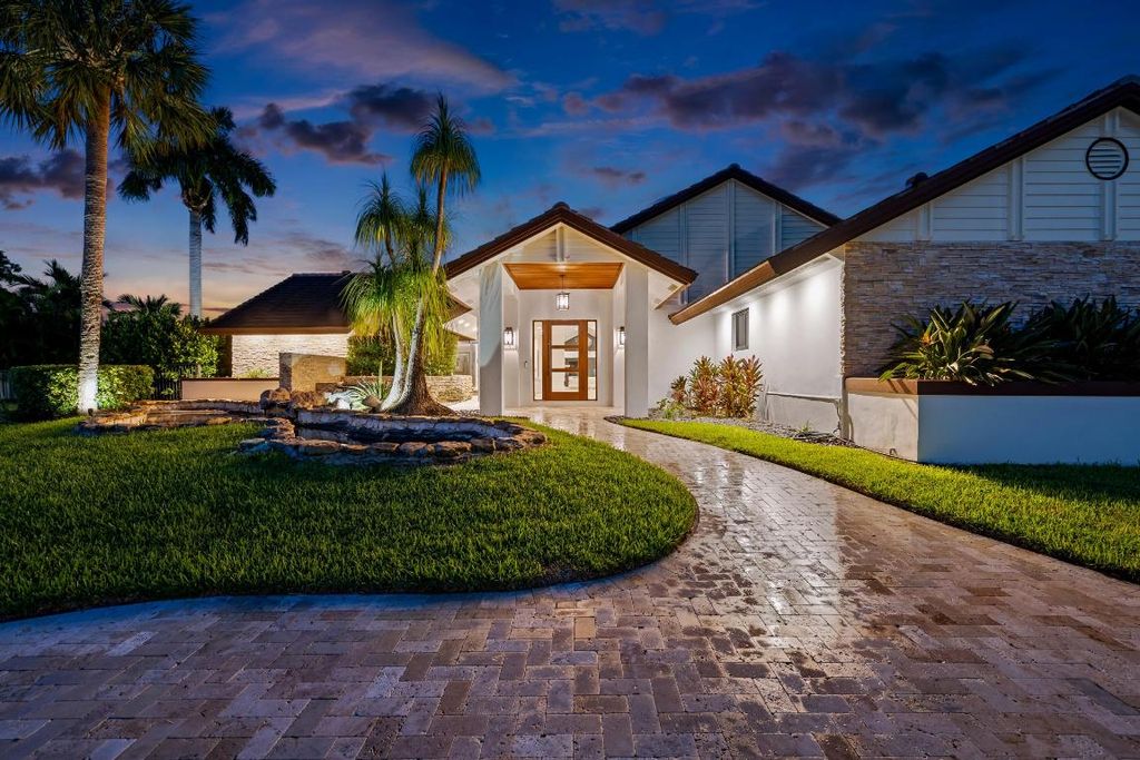 Photo of 910 Greensward Lane, Delray Beach, FL 33445 (MLS # R11122166)