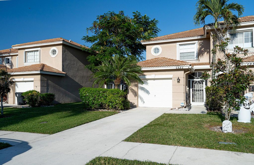 Photo of 7337 Smithbrooke Drive, Lake Worth, FL 33467 (MLS # R10930106)