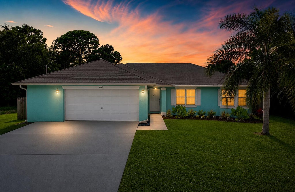 Photo of 402 SE Strait Avenue, Port Saint Lucie, FL 34983 (MLS # B26051715)
