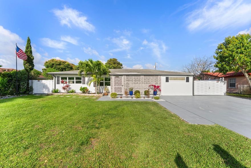 Welcome to this exceptional 3-bedroom, 3-bathroom home in highly desirable Lake Clarke Shores, offering the perfect blend of indoor comfort and outdoor living. This spacious residence features both a formal living room and a large family room, providing ample space for relaxation and entertaining.  Step outside to your private backyard oasis, complete with a sparkling pool, volleyball court, outdoor bar, and not one...but two fully equipped outdoor kitchens, ideal for hosting gatherings year-round. The property also includes a shed for additional storage and plenty of room for RV and boat parking. Inside, you'll find a unique beauty room that can also serve as an expansive primary walk-in closet, adding both luxury and versatility. Recent upgrades include updated plumbing and electrical systems, impact windows and doors for added safety and efficiency, as well as a 2020 water heater and 2020 A/C system for peace of mind.  This home offers a rare combination of lifestyle, space, and upgrades. All in a prime location close to everything Lake Clarke Shores has to offer.