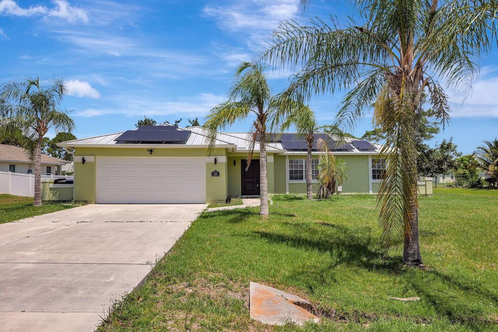 Photo of 1889 SE Gaskins Circle, Port Saint Lucie, FL 34952 (MLS # R10978689)