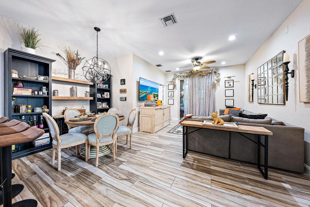 Photo of 4921 Bonsai 101 Circle #101, Palm Beach Gardens, FL 33418 (MLS # R11061436)