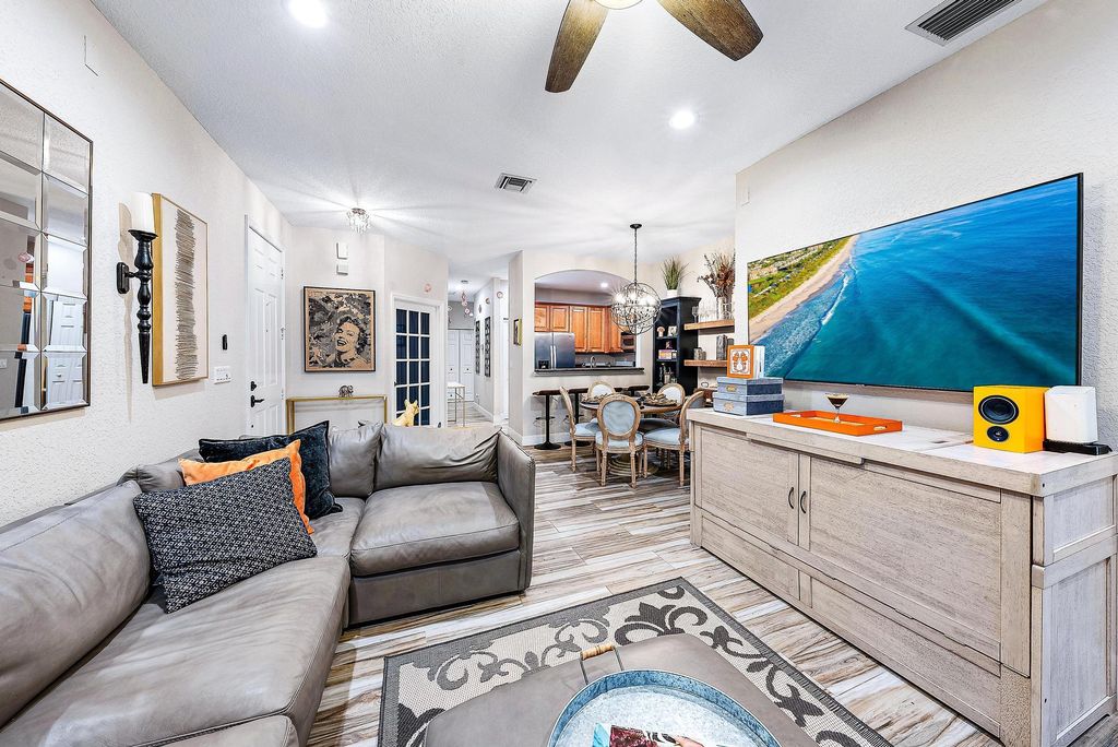 Photo of 4921 Bonsai 101 Circle #101, Palm Beach Gardens, FL 33418 (MLS # R11061436)