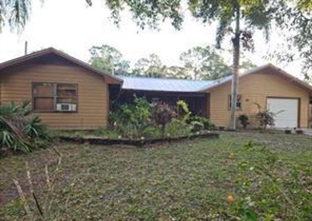 Photo of 202 Laidback Way, Fort Pierce, FL 34945 (MLS # R11160985)