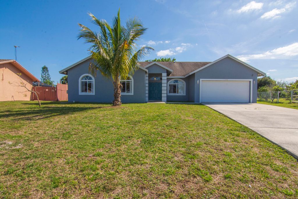 Photo of 694 SW Pueblo Terrace, Port Saint Lucie, FL 34953 (MLS # R10964486)