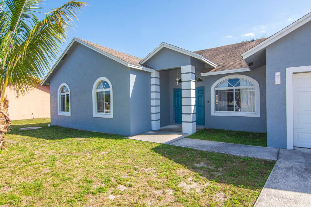 Photo of 694 SW Pueblo Terrace, Port Saint Lucie, FL 34953 (MLS # R10964486)