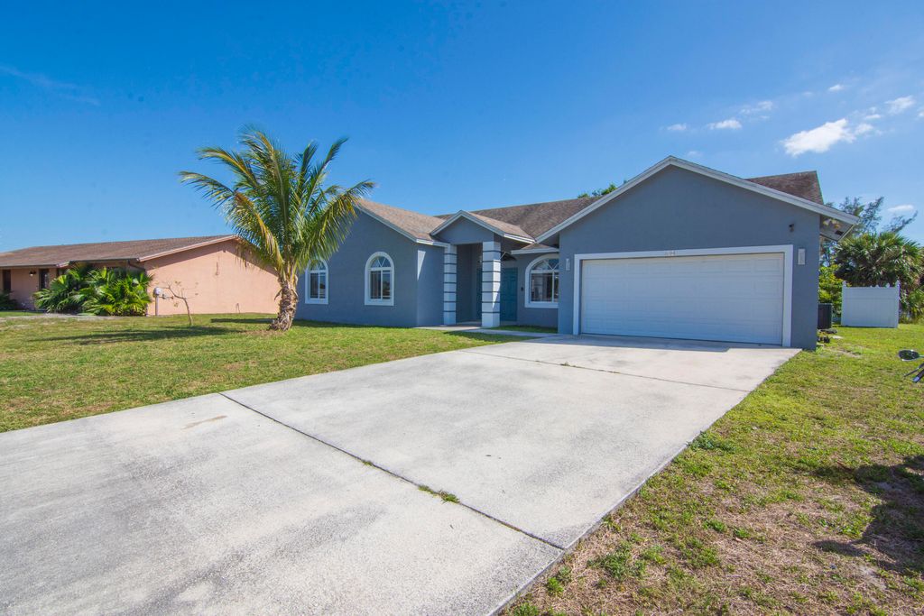 Photo of 694 SW Pueblo Terrace, Port Saint Lucie, FL 34953 (MLS # R10964486)