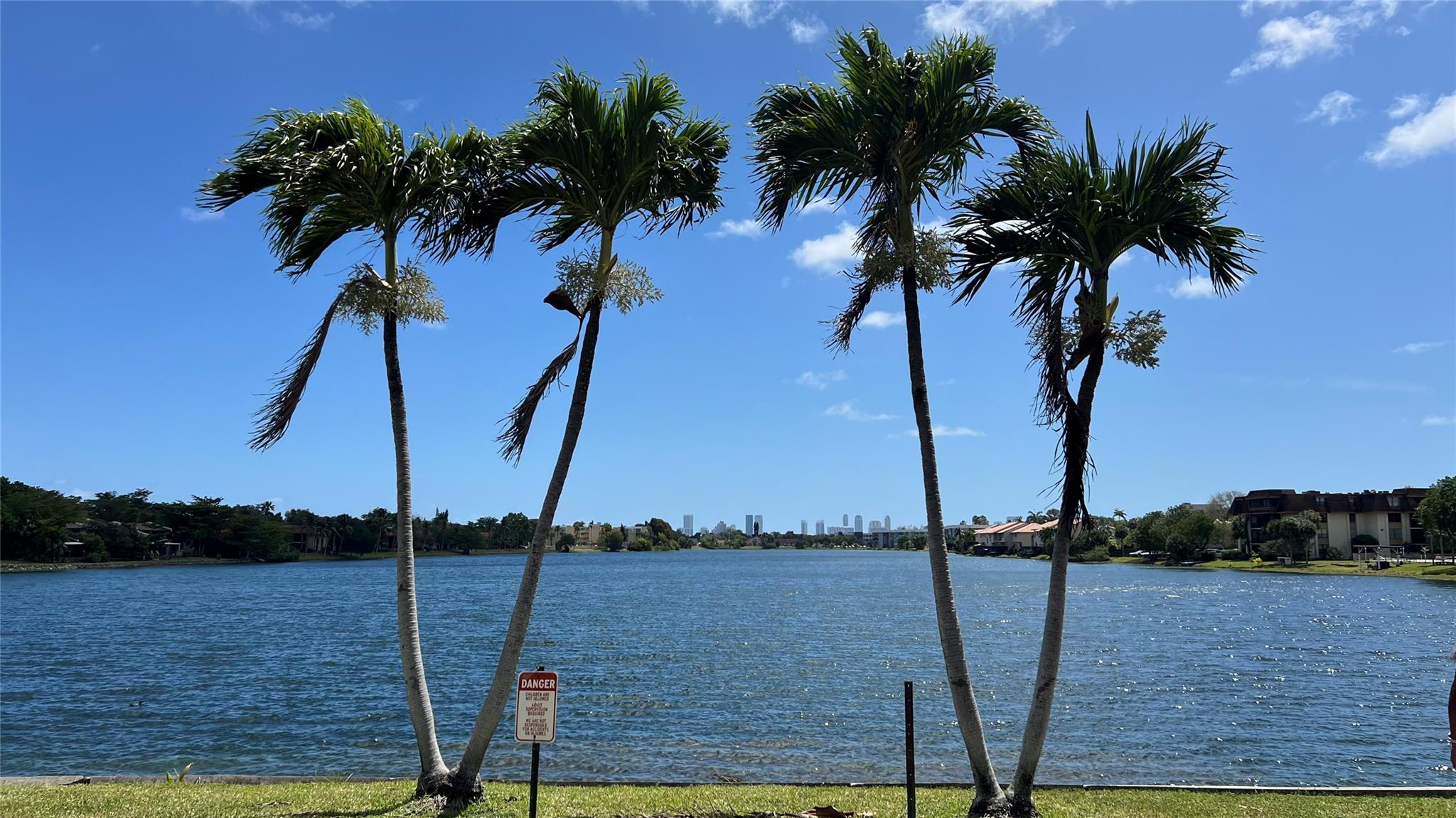 Lovely and spacious 2 bedroom 2 bathroom with the most breath taking view directly on the lake and can be seen throughout this condominium which is located in the California Club area. Master bedroom has a large walk in closet, large kitchen, large patio overlooking the lake to enjoy quiet evenings. Conveniently located 5 minutes to Aventura Mall, the beach, Hardrock Stadium. Seller is motivated!
