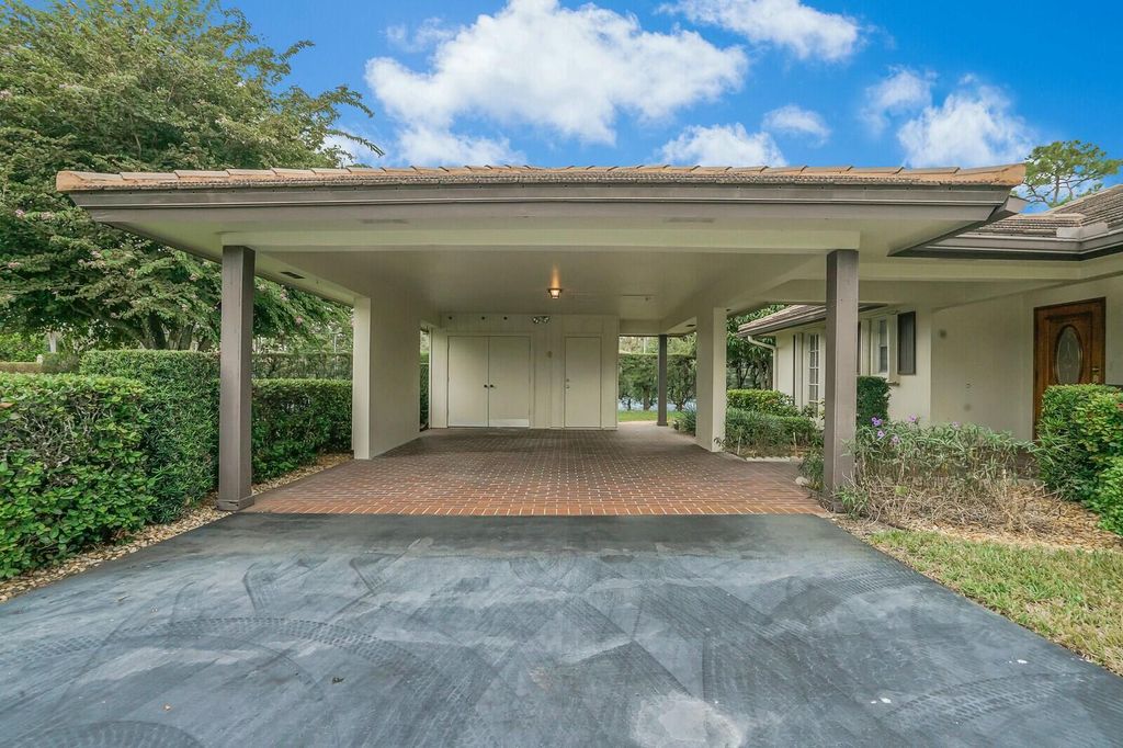 Photo of 501 Forestview Drive, Atlantis, FL 33462 (MLS # R11042454)