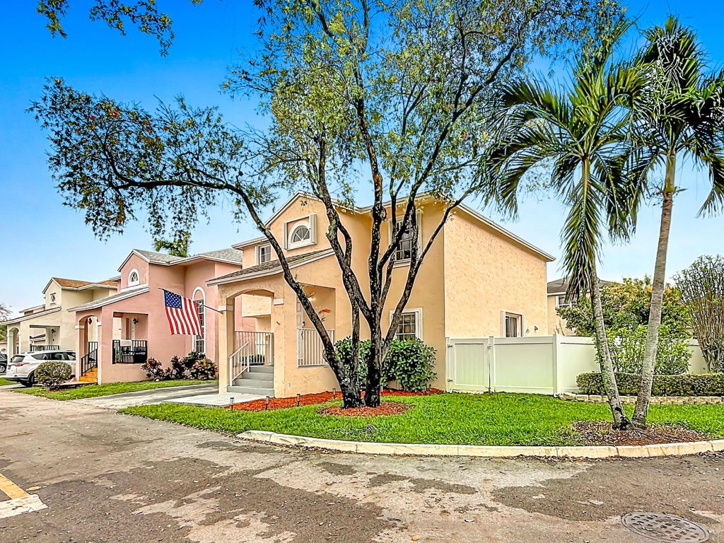 Photo of 12028 NW 13th Street, Pembroke Pines, FL 33026 (MLS # B26003095)