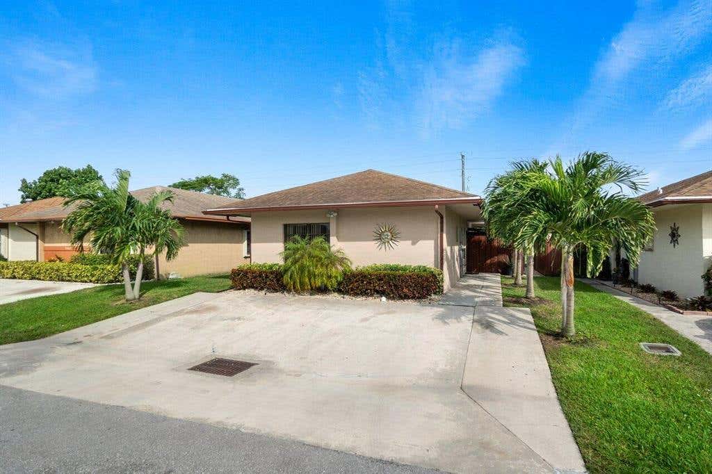 Photo of 5405 Garden Hills Circle, West Palm Beach, FL 33415 (MLS # R10760067)