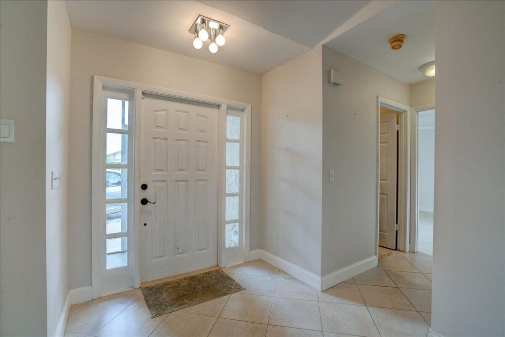 Photo of 715 NW 32nd Avenue, Delray Beach, FL 33445 (MLS # R11029737)