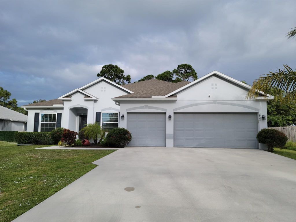 Photo of 3925 SW Kakopo Street, Port Saint Lucie, FL 34953 (MLS # R11035988)