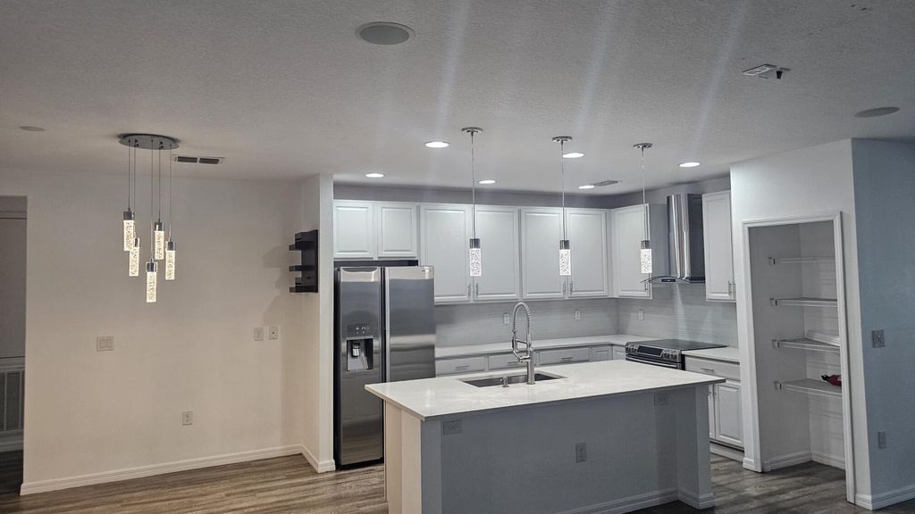 Photo of 3925 SW Kakopo Street, Port Saint Lucie, FL 34953 (MLS # R11035988)