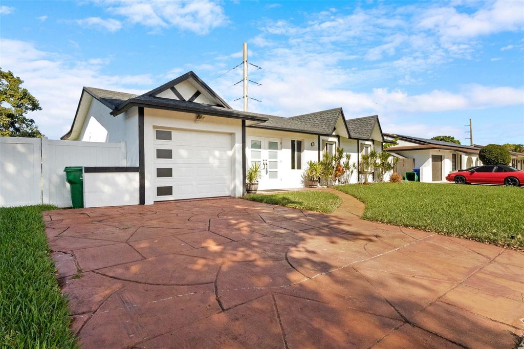 Photo of 9231 N Cypress Circle, Miramar, FL 33025 (MLS # F10549392)