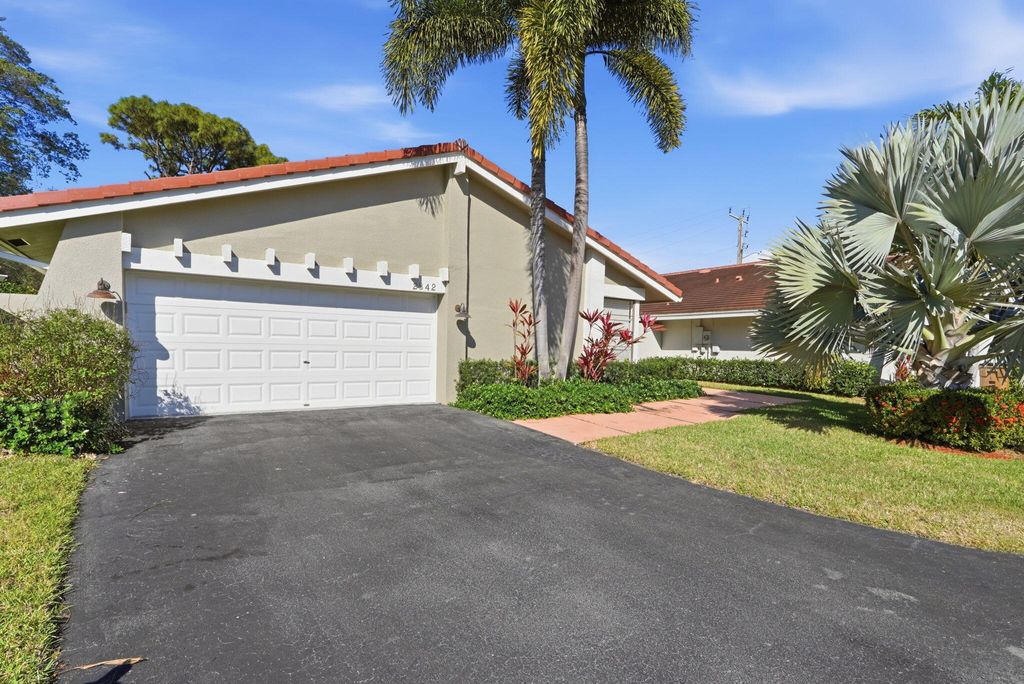 Photo of 2842 Kelly Brooke Lane, Deerfield Beach, FL 33442 (MLS # R11166804)