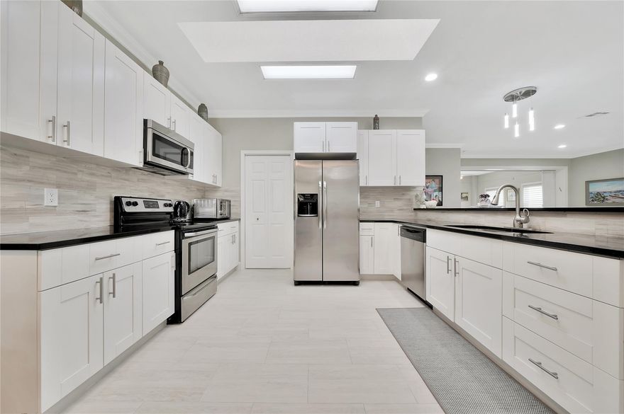 *PRICED TO SELL!* Welcome to Pine Ridge community largest, &  most exquisite home remodel to date! This amazing move in ready 3 bedroom 2 bathroom home is perfect for those who appreciate attention to detail. NO expense spared in this complete renovation; NEW electric, plumbing, molding, tile floors, doors, & even new lanai! You'll be captivated by the designer remolded bathrooms, molding, modern lighting & impact glass throughout the home. With an accordion door that converts the Florida room to a 4th bedroom, this home offers flexibility & functionality. The newly painted interior features light, neutral tones, making it move-in ready. Relax in your  new brand lanai than retreat to your turn key home. Pine Ridge is a 55+ community w/a clubhouse, 2 pools,spa,  tennis & pickle ball. All information herein deemed reliable and subject to errors, omissions, or changes at any time. All measurements are approximate. All parties should perform their due diligence to verify any and all information. No commission or retained deposits paid to co broker until title passes.