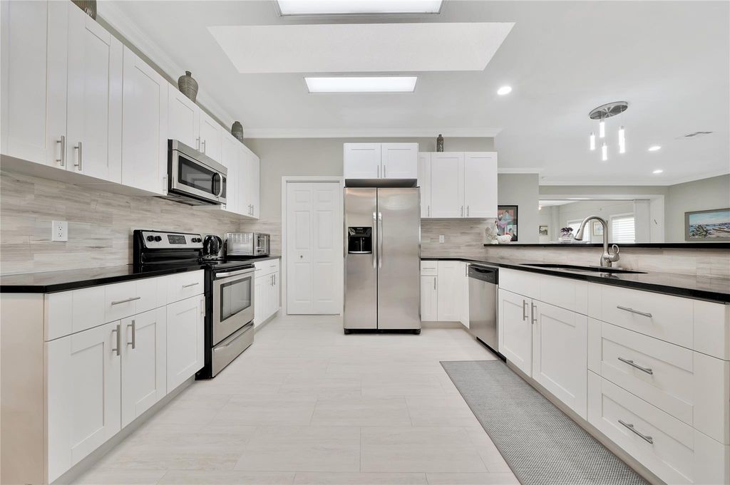 Photo of 7808 Mansfield Hollow Rd, Delray Beach, FL 33446 (MLS # F10406888)