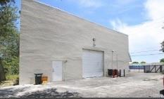 This fully renovated, two-level, 4,000 SF industrial/flex space property that offers direct access to I-95 and great visibility on McNab Road. Ideal for office or showroom use, it features showroom-quality garage/warehouse with a large roll-up door and a secure, gated lot with 9 parking spaces. The ground floor includes multiple offices and a full bath with shower, while the second floor offers additional offices, a kitchen, full bath, and new A/C. Washer/dryer hookups and flexibility to expand the small warehouse area add to the appeal. With 7,869 SF of gated land, this property is a versatile, move-in-ready space. Architectural plans are available for review.