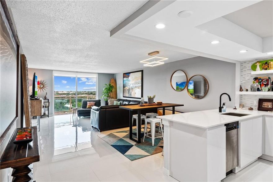 This Spacious and Modern 7th Floor Condo offers Breathtaking, Unobstructed Waterfront Views with an incredible display of fireworks on the 4th of July and New Years.The Secure Building offers guest parking and a covered private parking space for the Owner.  The property is just a few minutes walk to the beach and a short bike ride to the famous Hollywood Beach boardwalk. Close to US-1, A1A and Gulfstream Park.Call me now to schedule a private showing.