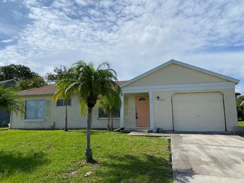 Photo of 2392 SE Maslan Avenue, Port Saint Lucie, FL 34952 (MLS # R10808400)