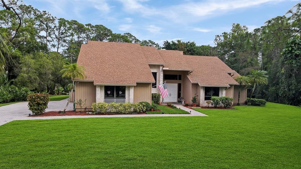 Photo of 10395 Trailwood Circle, Jupiter, FL 33478 (MLS # R10673051)